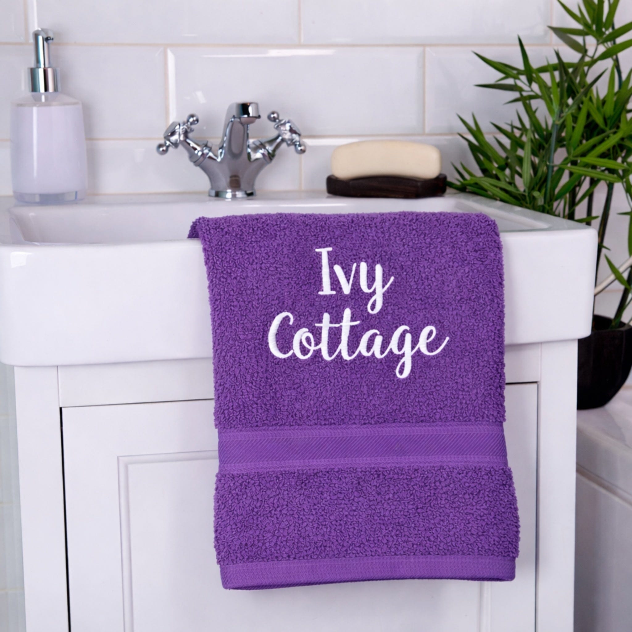 name on purple hand towel