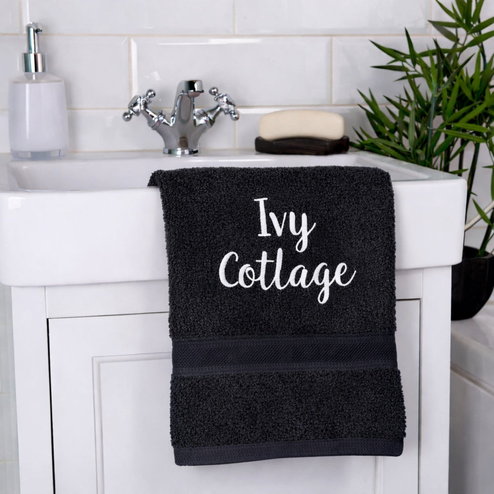 name on black hand towel