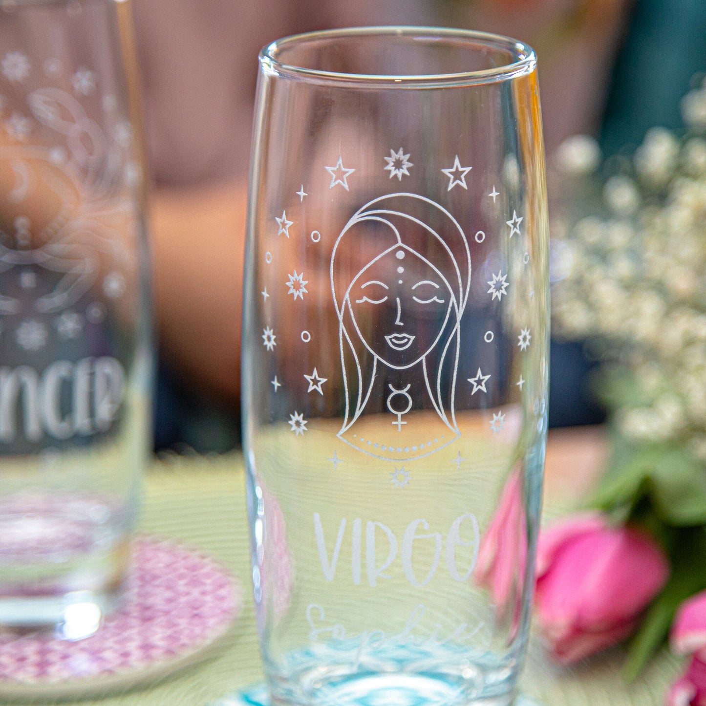 A Personalised Hi-Ball glass with a Zodiac sign and a name engraved closeup