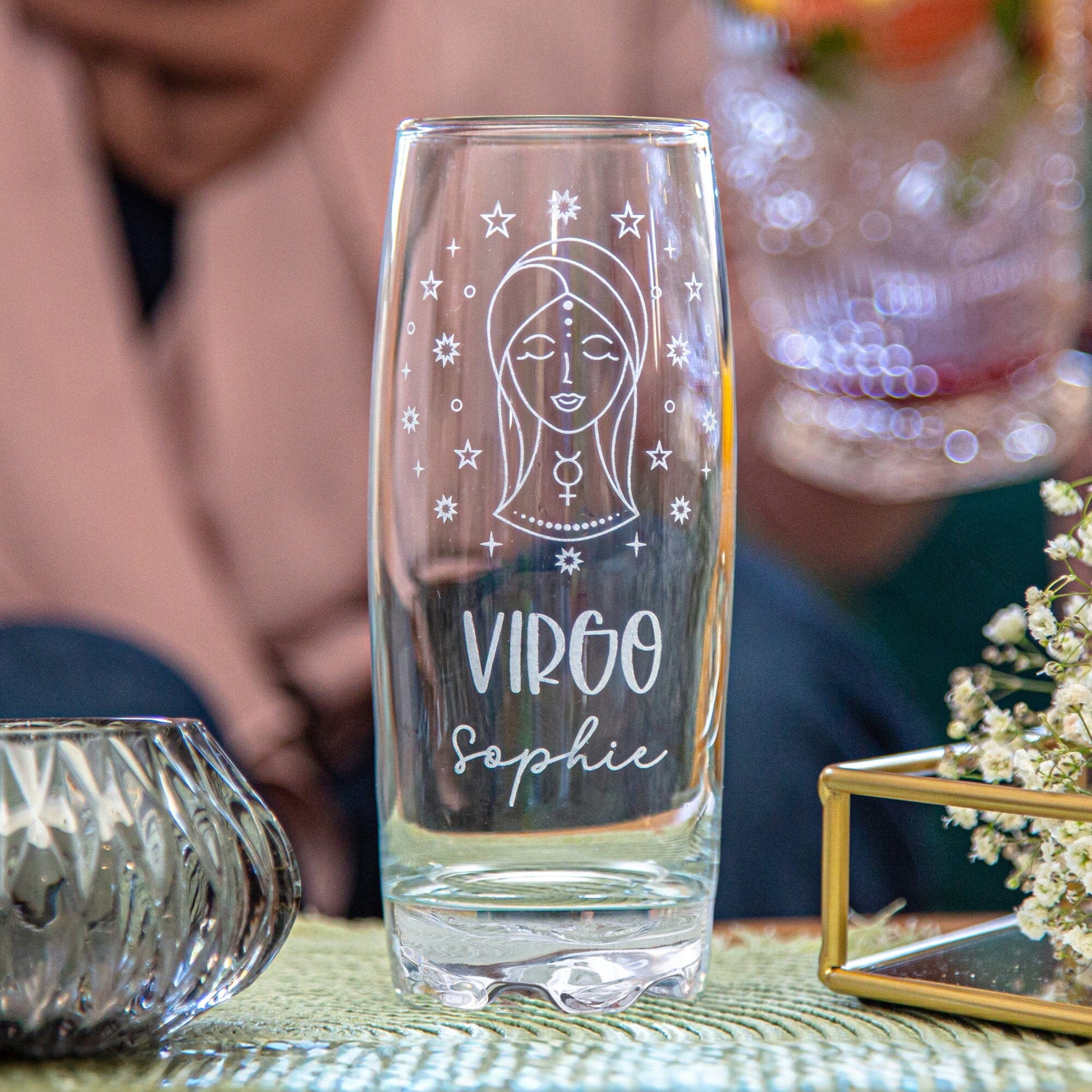 A Personalised Hi-Ball glass with a Zodiac sign and a name engraved