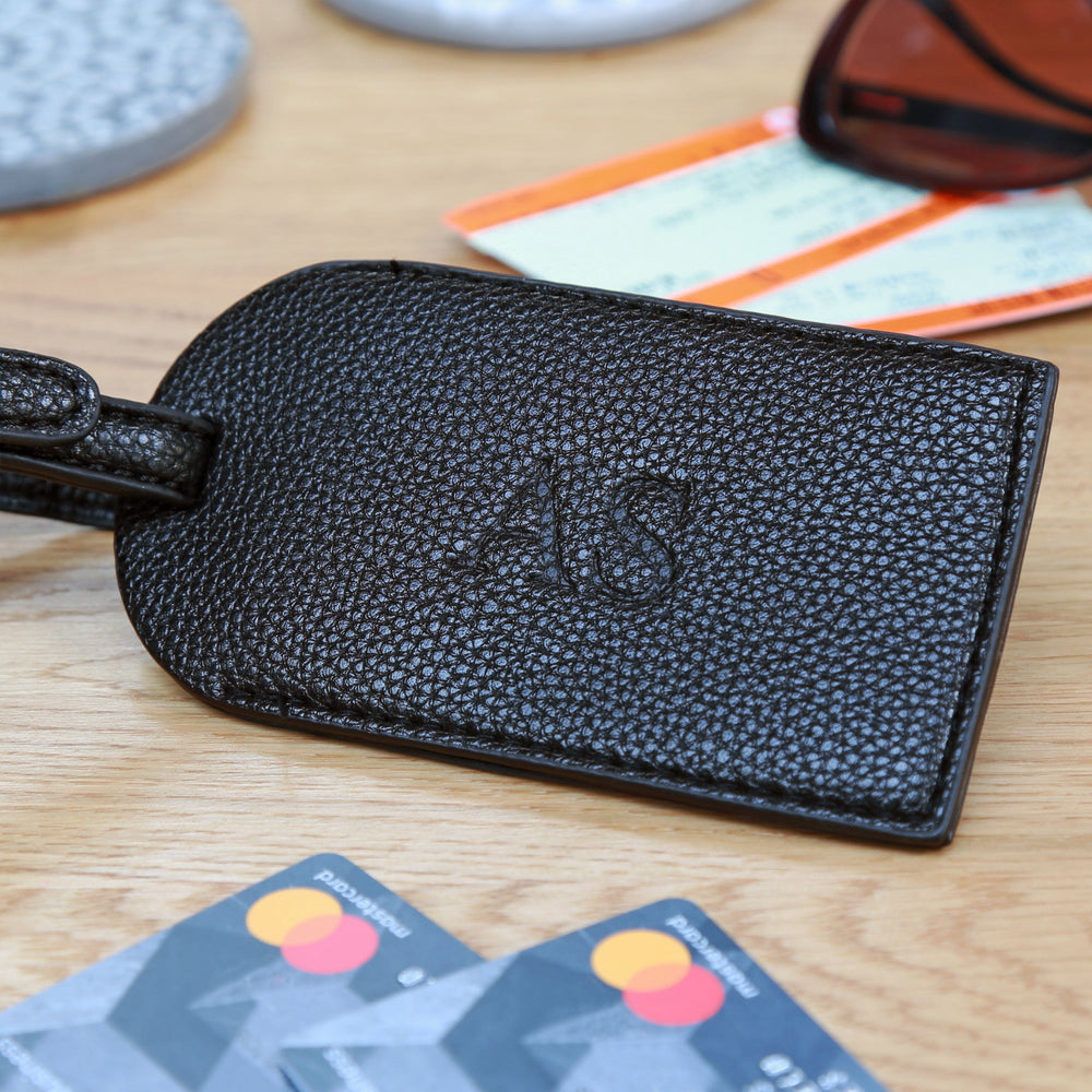 debossed luggage tag in black