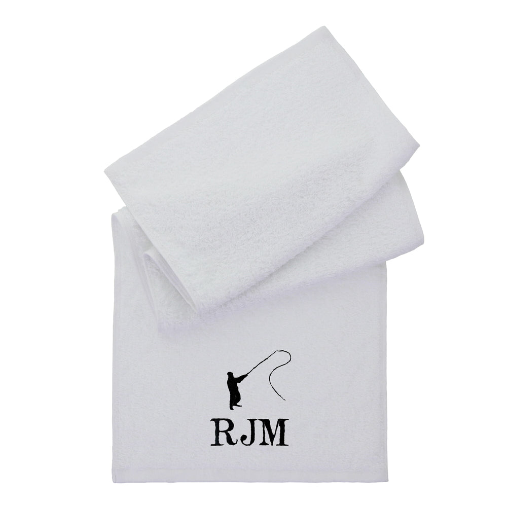 Personalised white towel folded on a plain white background with Embroidered fishing silhouette