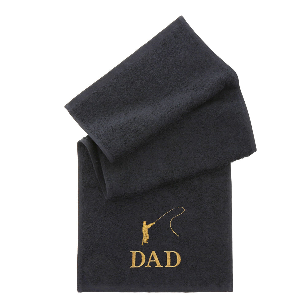 Personalised black towel folded on a plain white background with Embroidered fishing silhouette