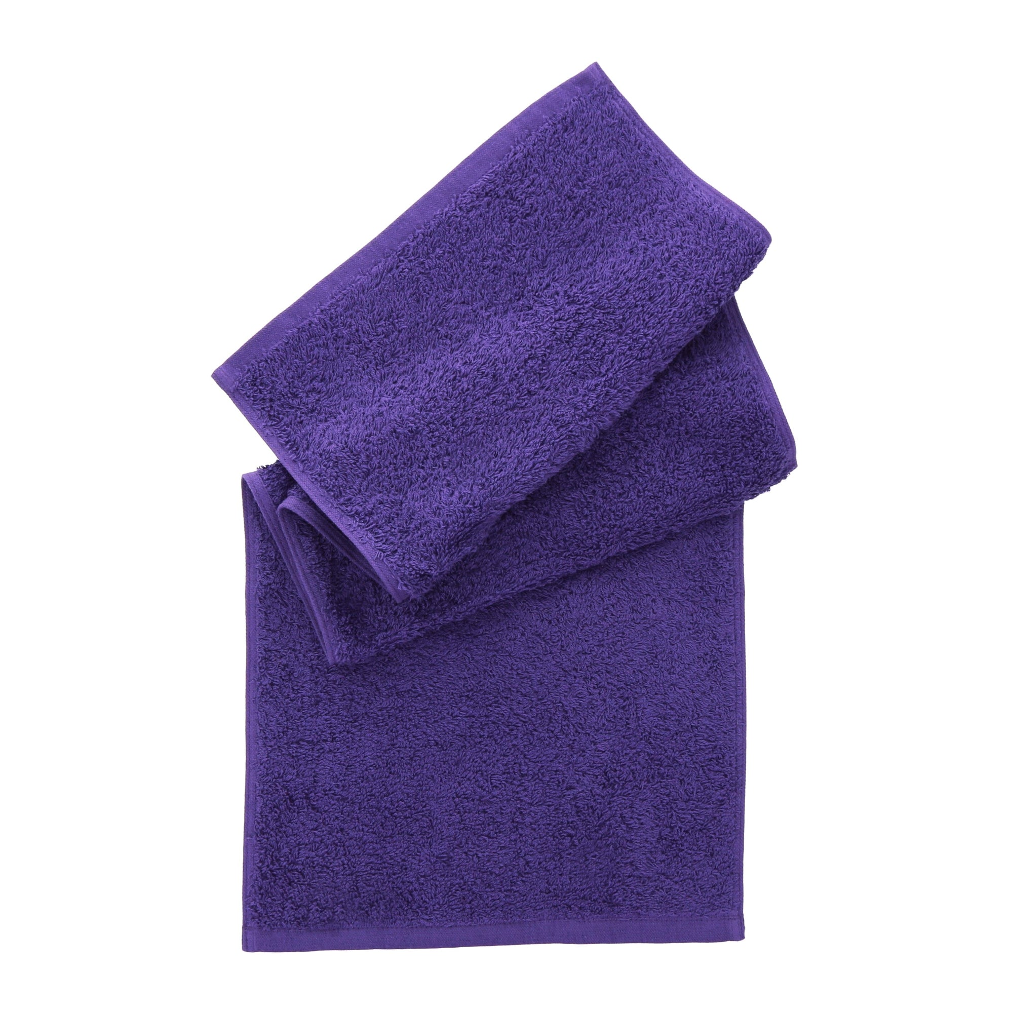 Two folded purple towels stacked on a plain white background, with the larger bath towel underneath and a smaller hand towel on top.