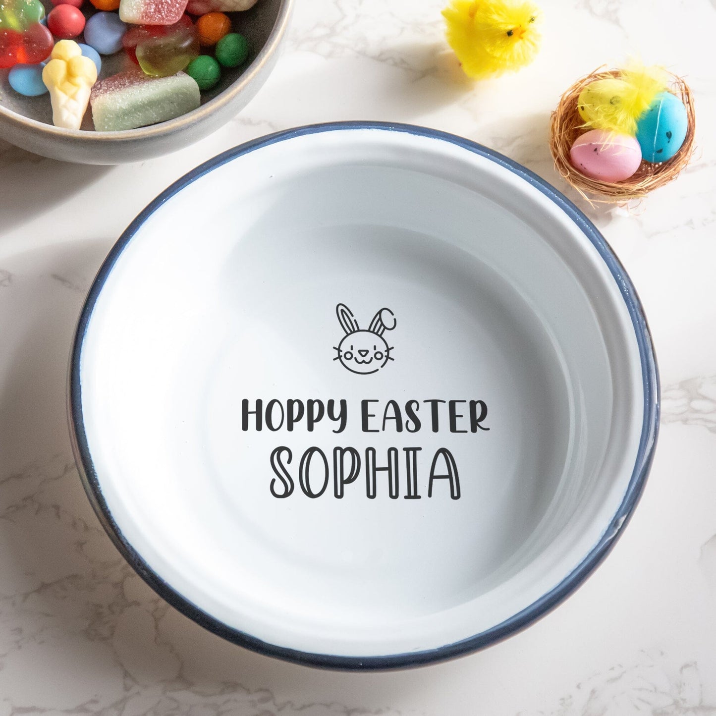 Personalised Hoppy Easter Enamel Bowl with easter decorations around