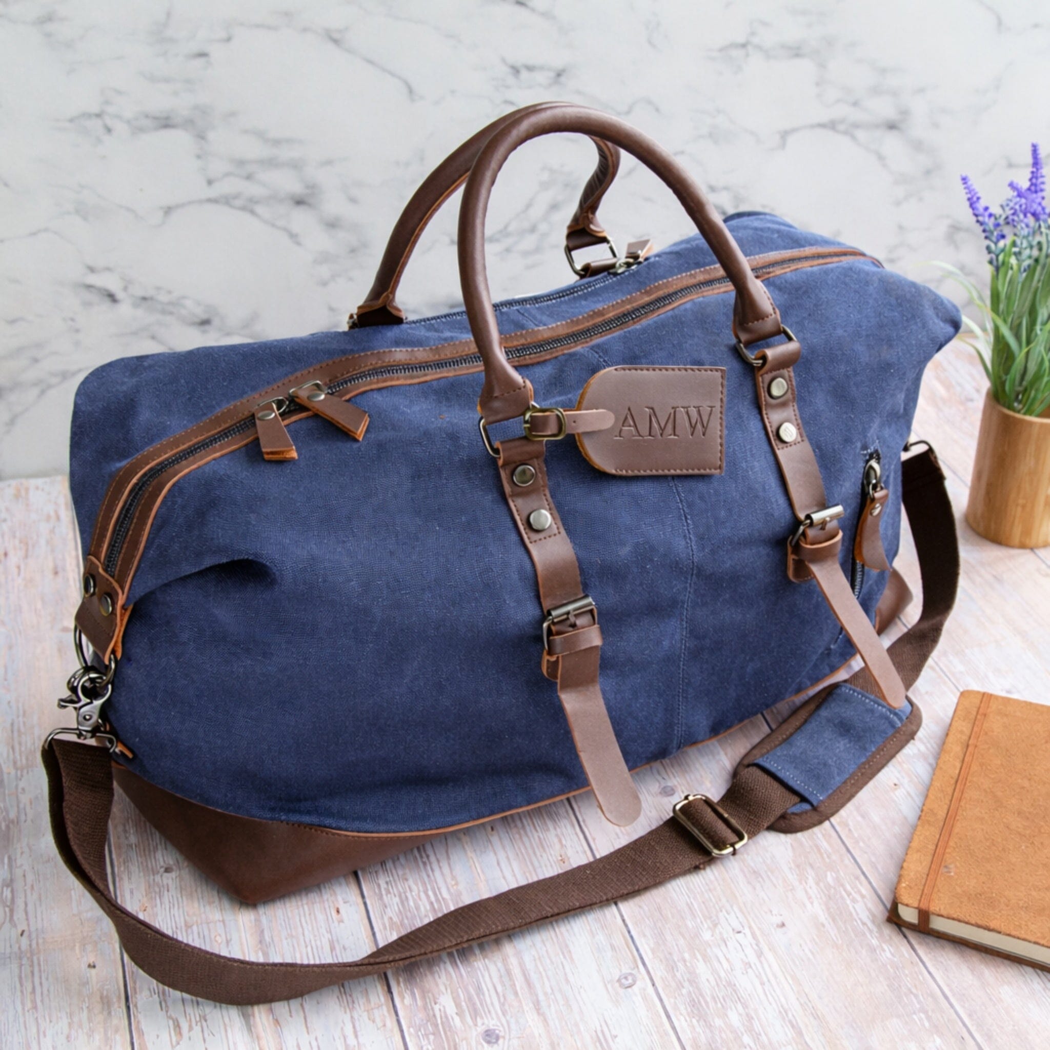 debossed letters on blue bag