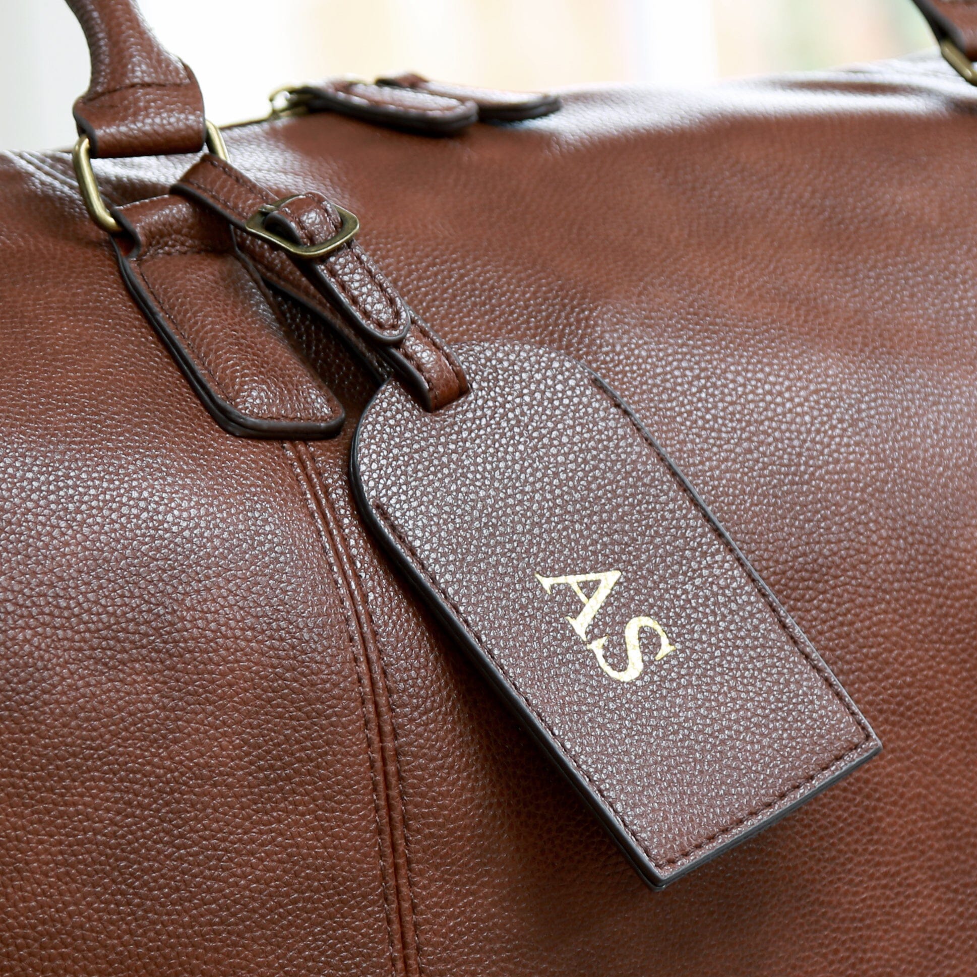 Closeup of the Personalised Brown Luggage Tag Gold Foil Debossed   