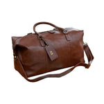 Personalised Brwon Luggage Tag And PU Leather Holdall Set on White Backdrop   