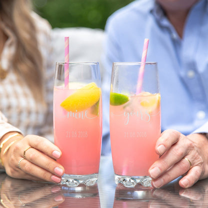 A couple holding the Personalised Mine And Yours Hi Ball Glass Tumbler Set 