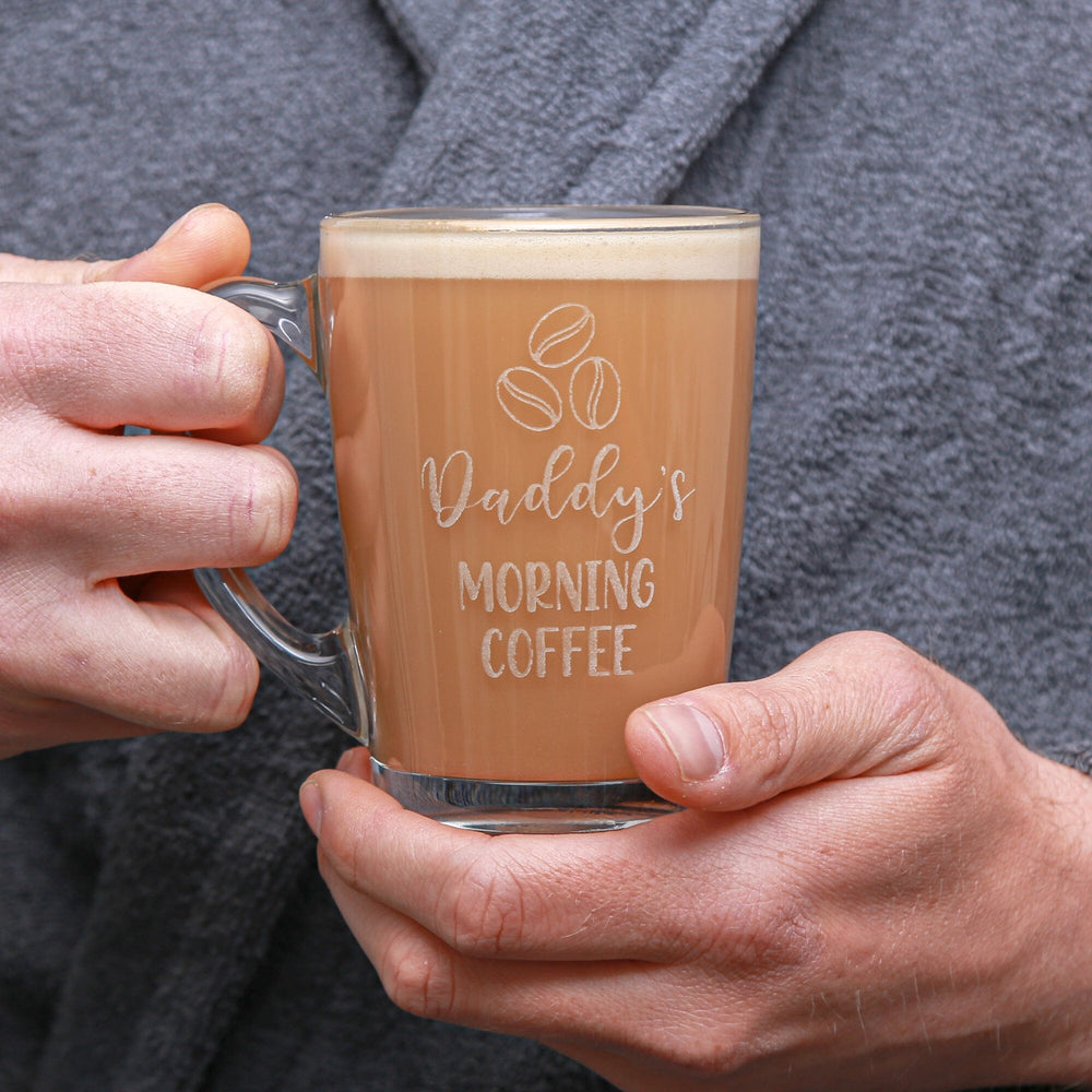 A man holding the Personalised Morning Coffee Glass Mug  with coffee in it