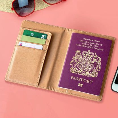 Open passport holder with credit cards and passport