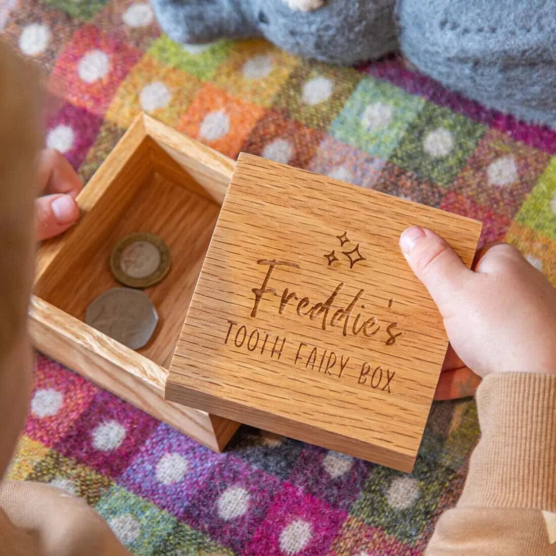 a kid opening the Personalised Oak Tooth Fairy Box   