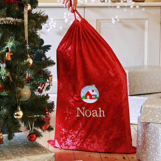 Personalised Santa Gift Sack With Christmas Cottage Design