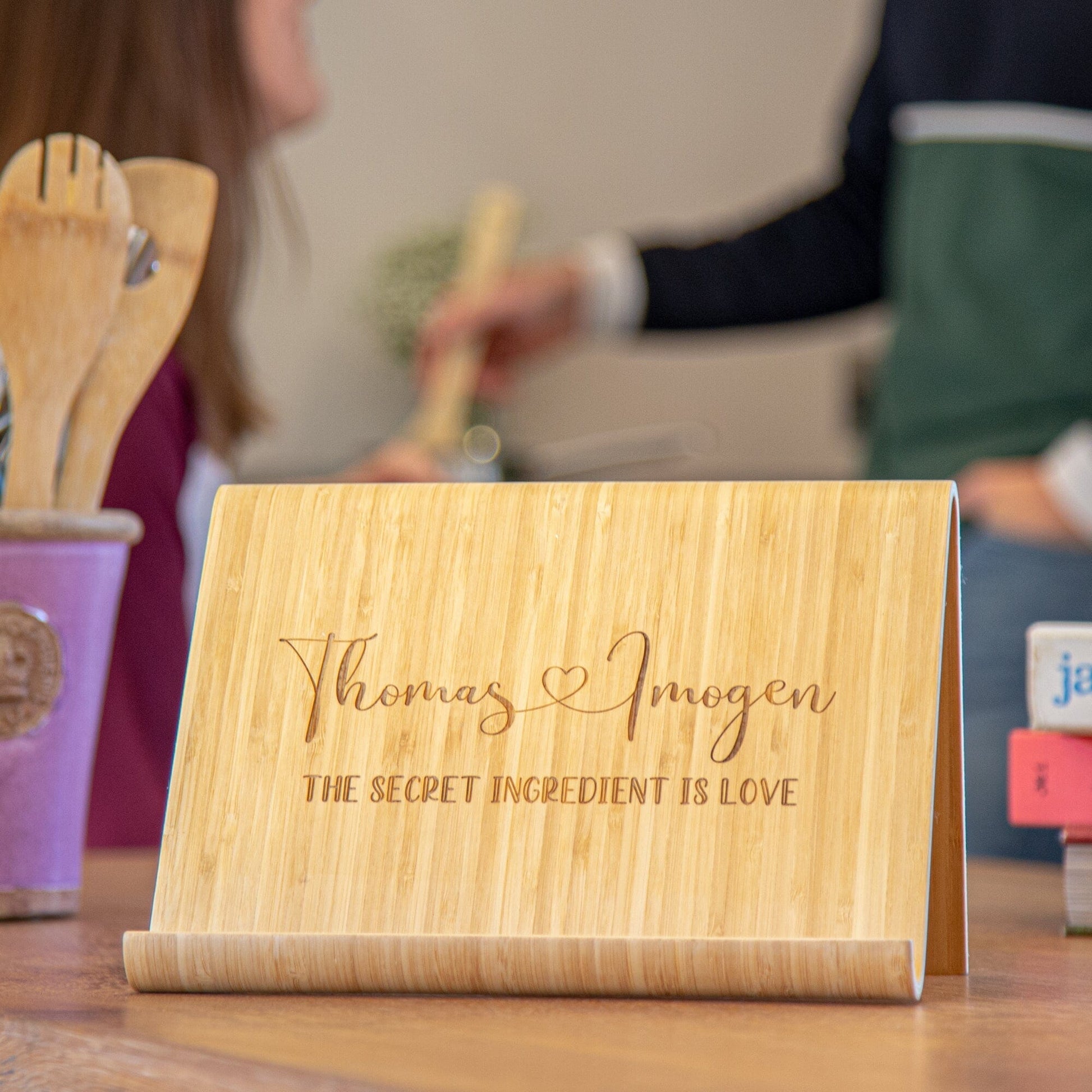 Personalised Secret Ingredient Bamboo Cook Book Stand on the kitchen counter