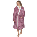 Woman wearing an embroidered Lavender sherpa robe with 'Self Love Era' logo, on a white backdrop