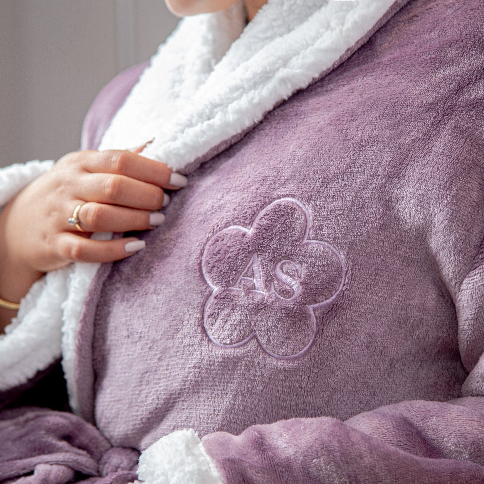 a close up of Female model wearing a lavender Personalised Sherpa Style Monogrammed Robe