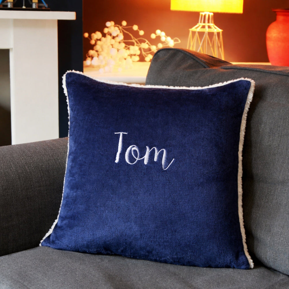 name on navy cushion