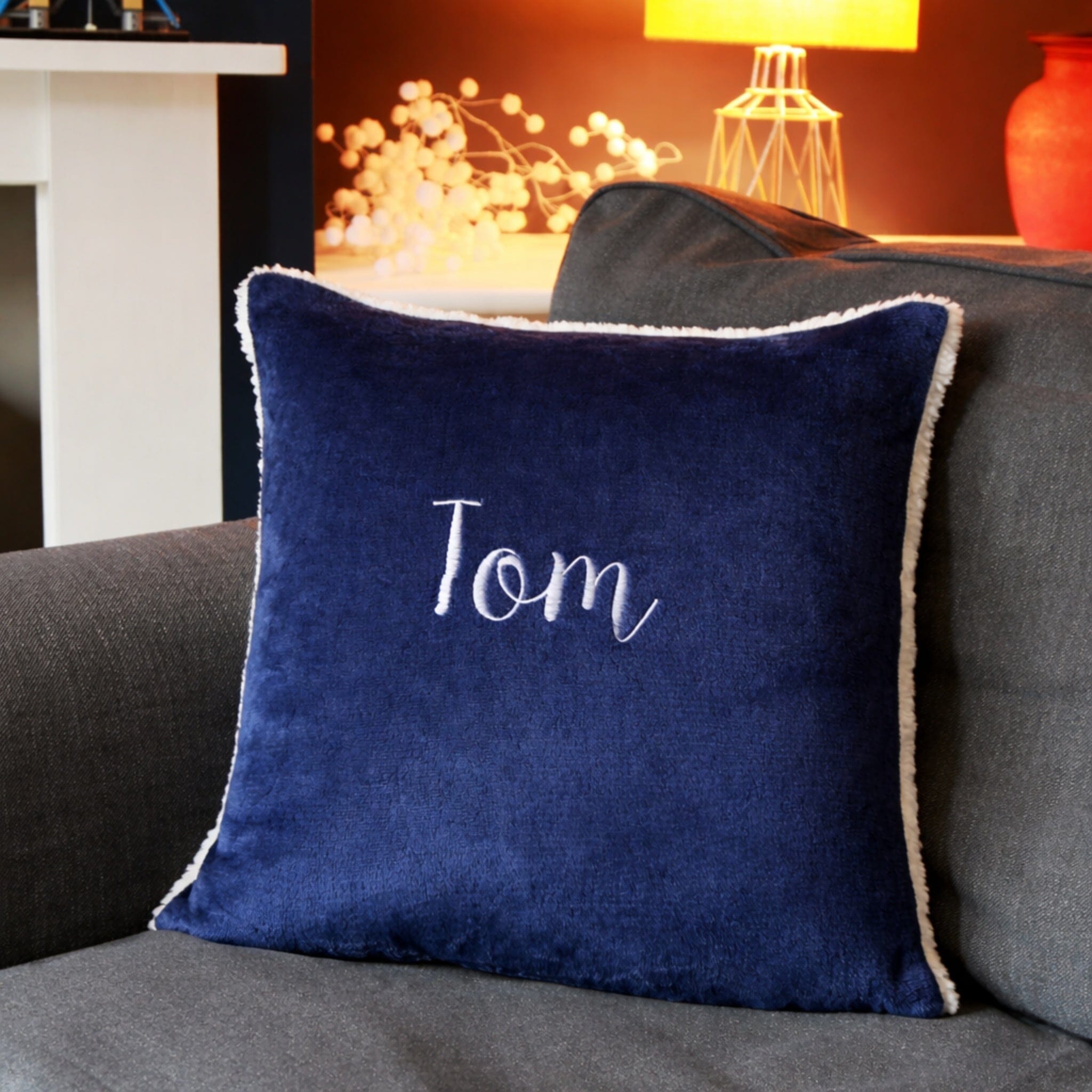 name on navy cushion
