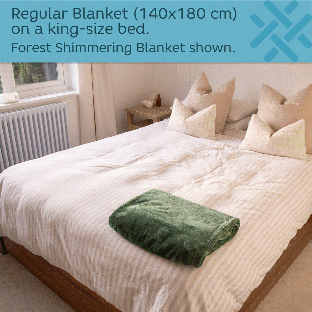 140 x 180cm blanket unrolled onto a king size bed