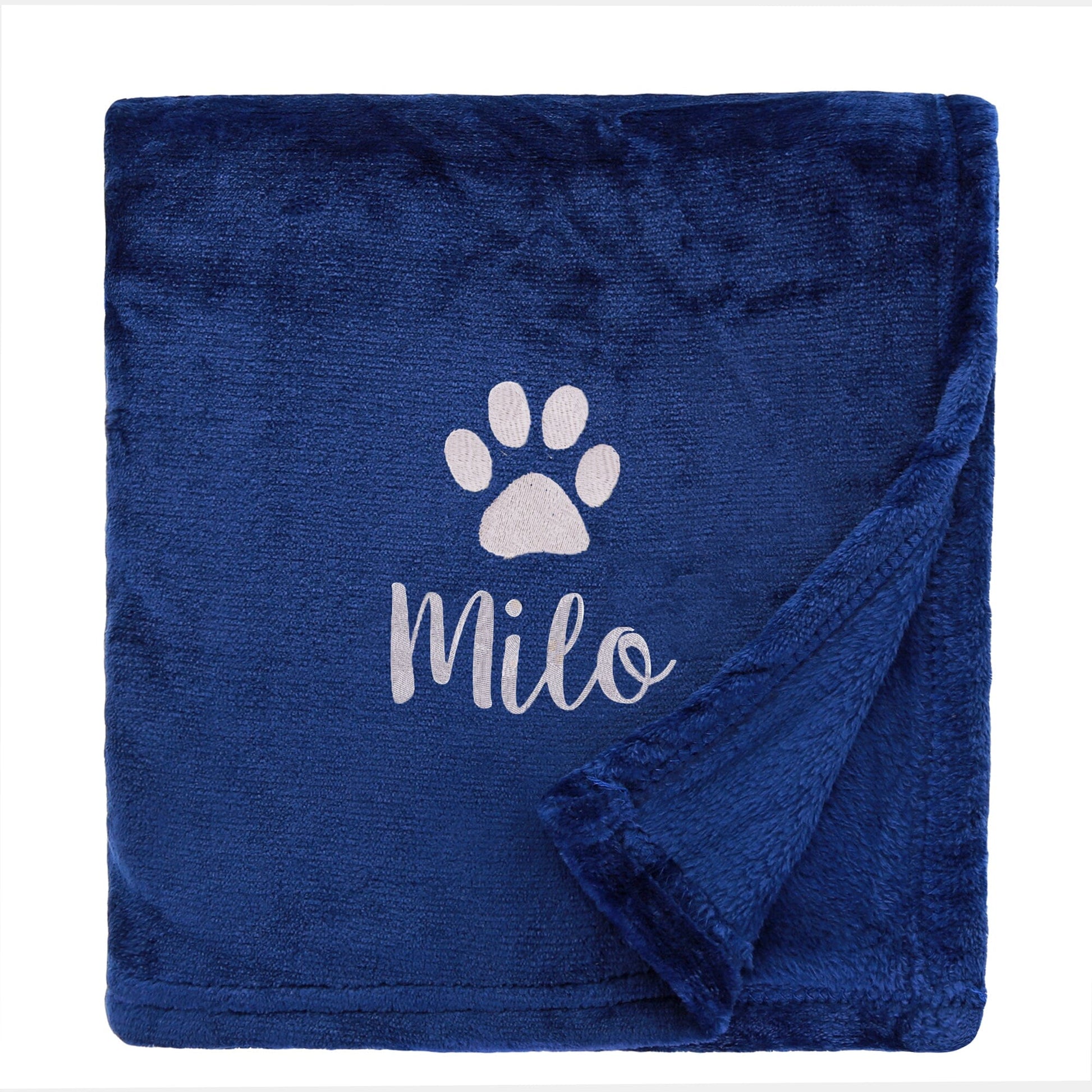 Navy Dog Throw with a pawprint design and personalisation of 'Milo'