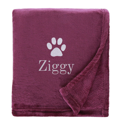 Plum Dog Throw with a pawprint design and personalisation of 'Ziggy'