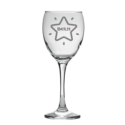 A personalised wine glass with a name inside a start