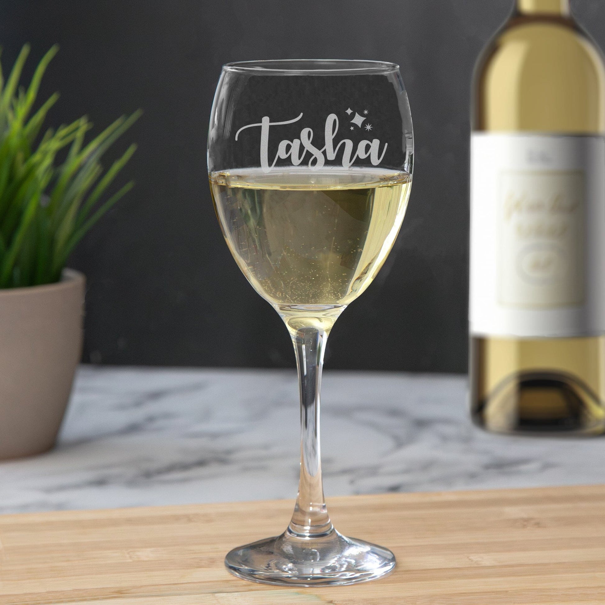 A personalised wine glass with stars