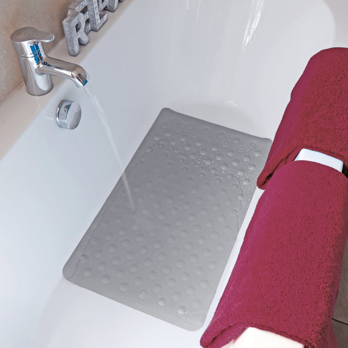 Slate Bubble Bath mat inside a bath mat