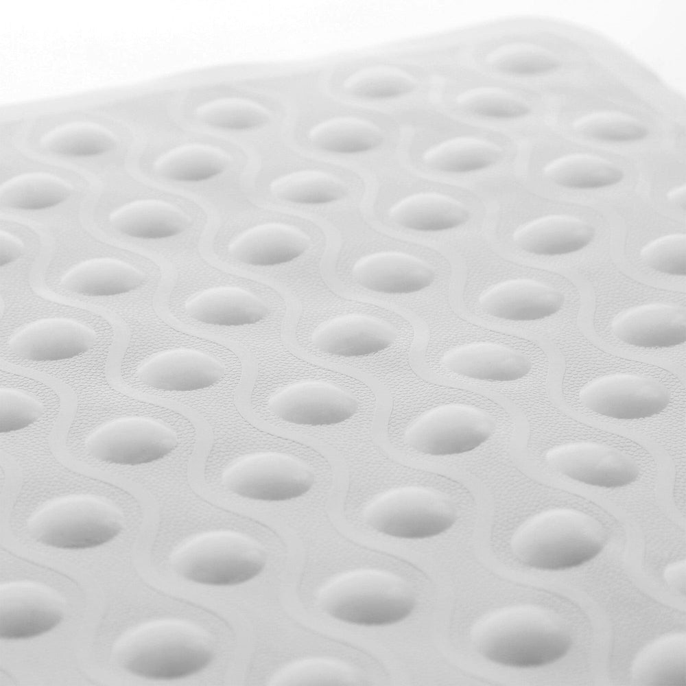 Closeup of white Rubber Bubble Shower Mat on white backdrop