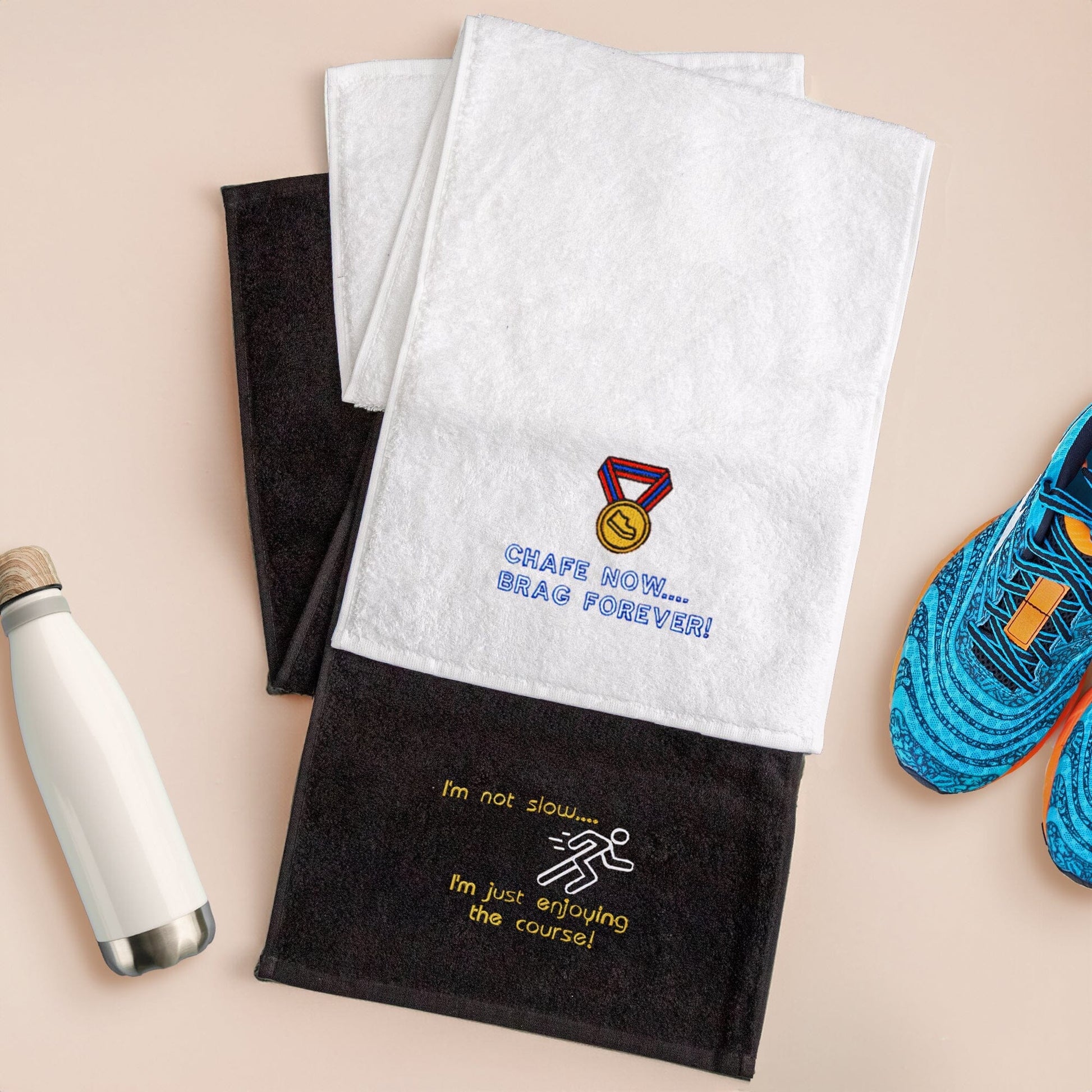 Towels with embroidered running logos