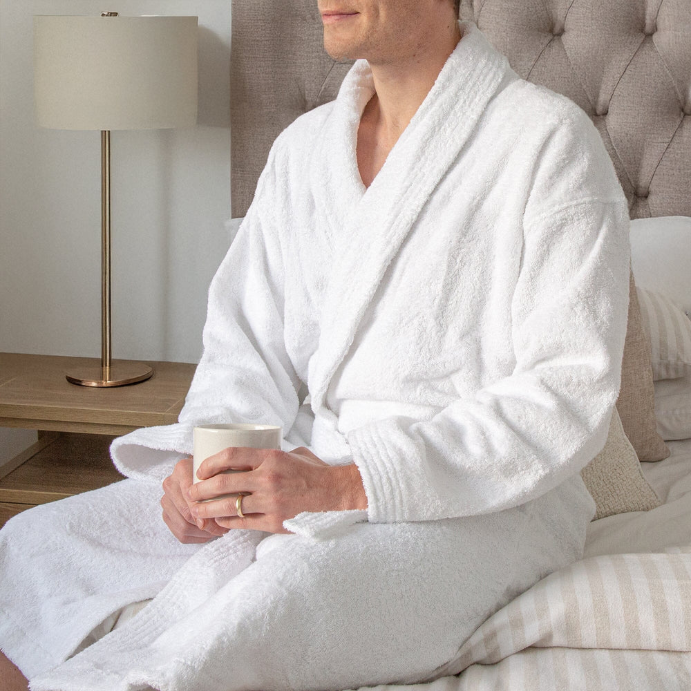 man wearing a white bathrobe