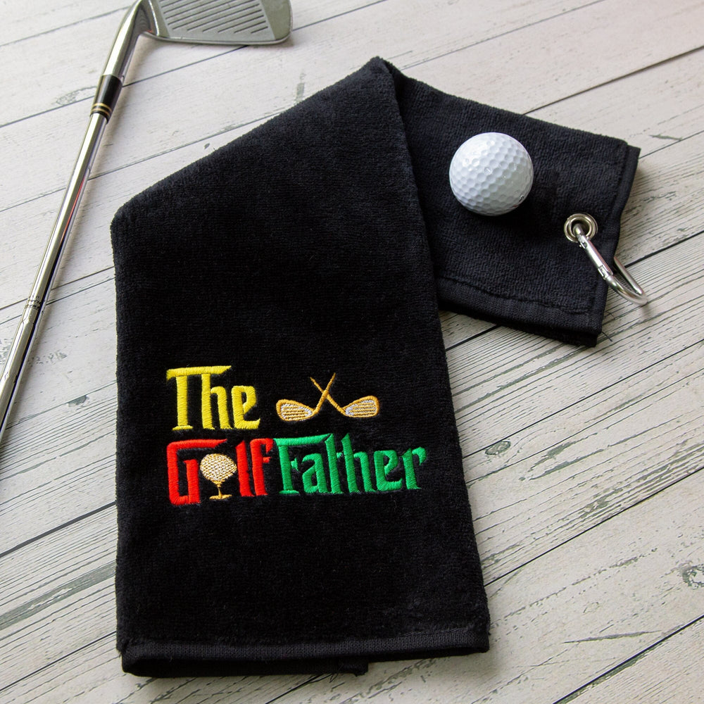 Lifestyle image of a Black Embroidered Golf Father Golf Towel