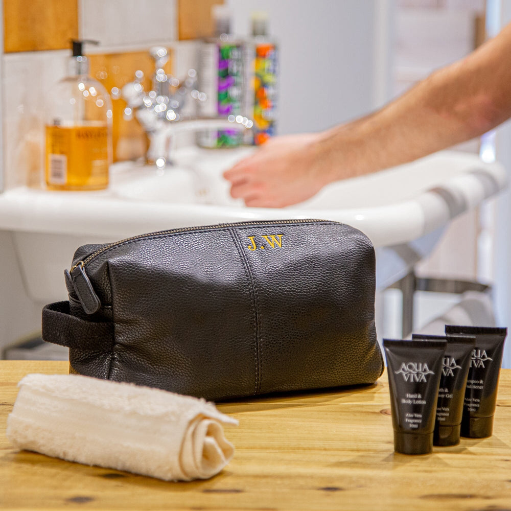 Black wash bag with embroidery