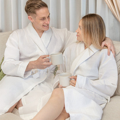 couple wearing white waffle bathrobes