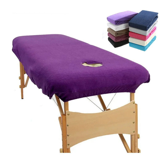 plinth cover in purple, with a face hole on a portable massage bed. White background image with a colour range image empossed in the corner.