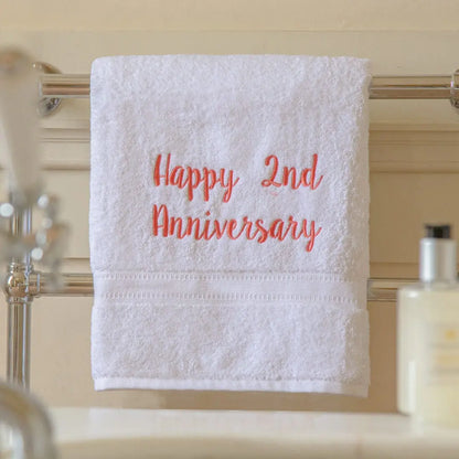 white towel personalised with Happy 2nd Anniversary