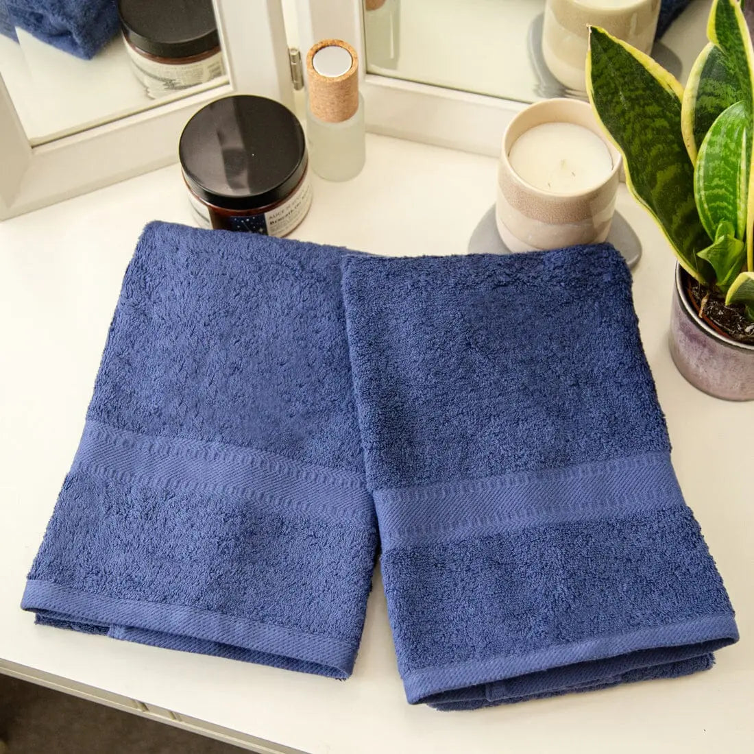 pair of navy blue towels