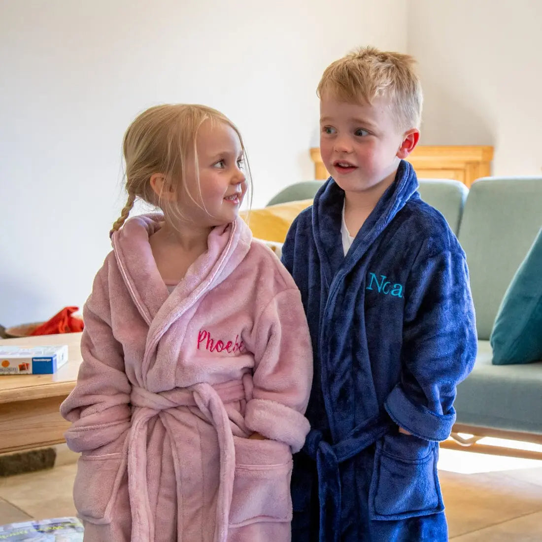 lifestyle shot of a boy and girl wearing the robe