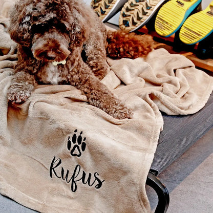 Personalised Dog Blanket with Rufus and a Paw Logo Embroidered on, Rufus and the blanket are on an elevated pet bed