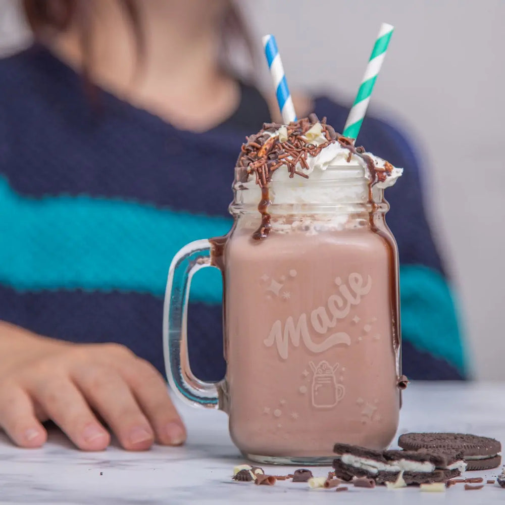 Personalised Milkshake Glass Mason Jar with milkshake in it and a model in the backdrop
